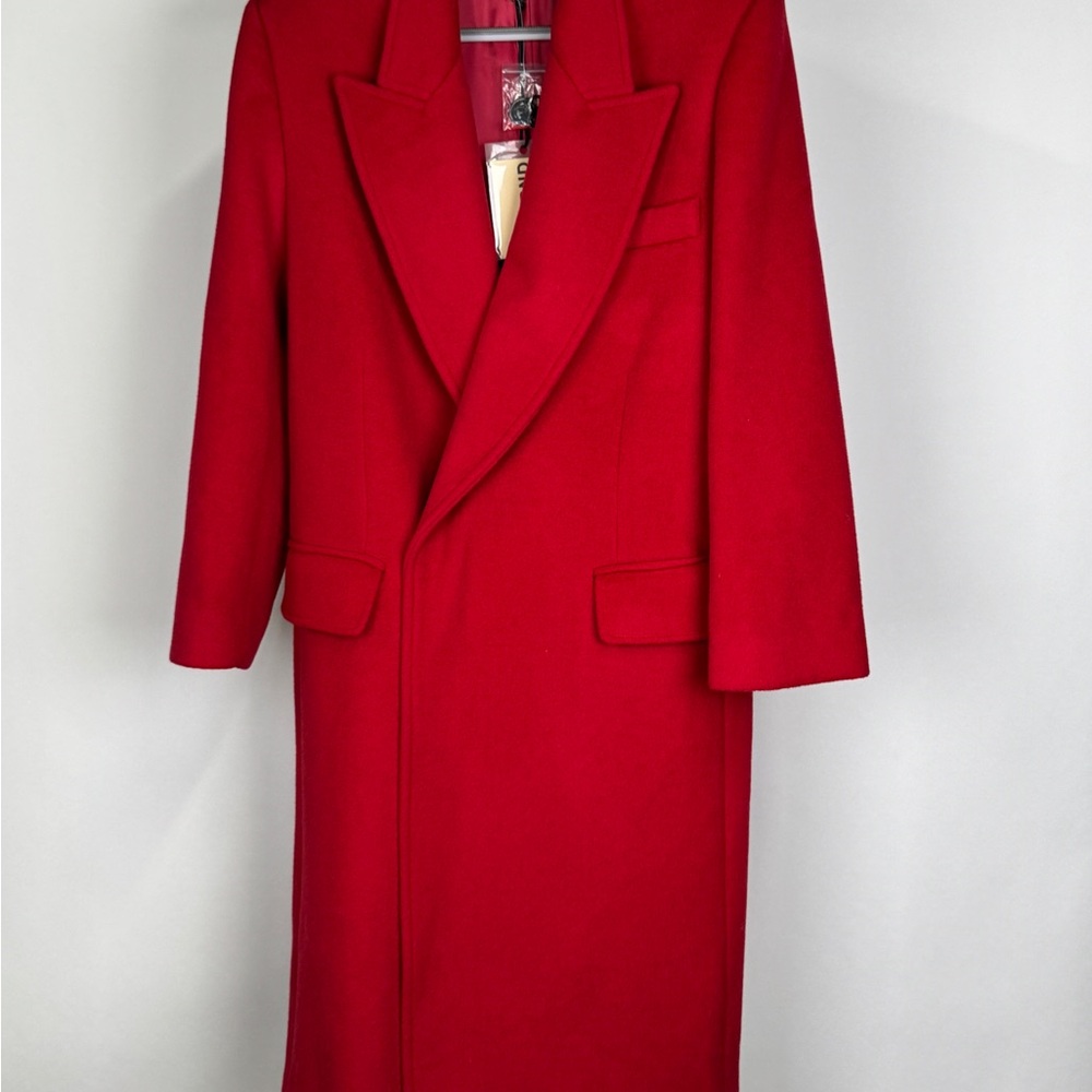 GRLFRND wool long coat with peak lapels and a button closure